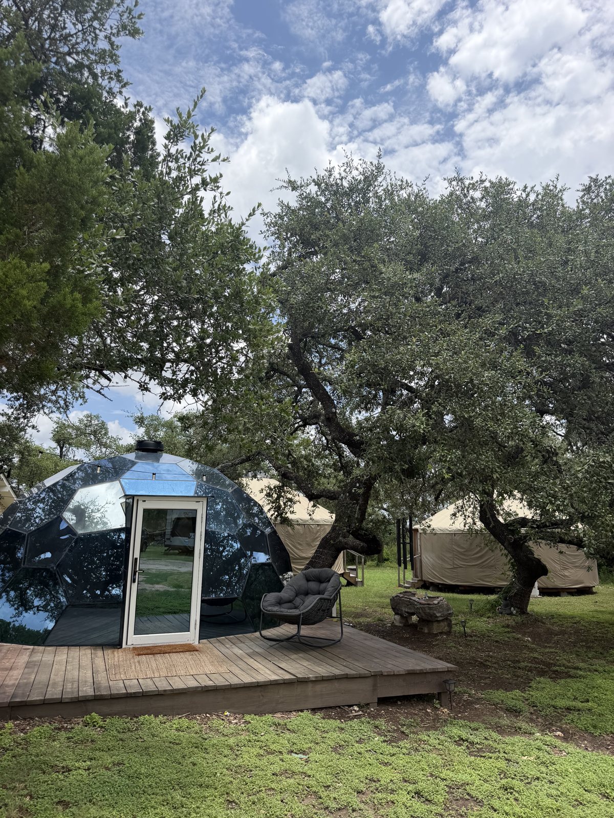 Honeycomb glass dome under live oak trees at AWKN Ranch